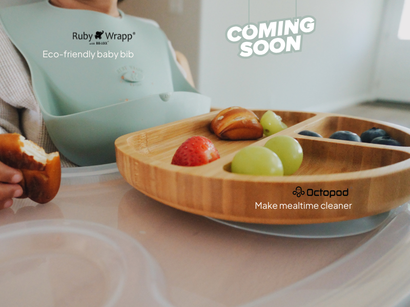 Silicone RubyWrap baby bibs in pastel colours with a deep food-catching pocket.