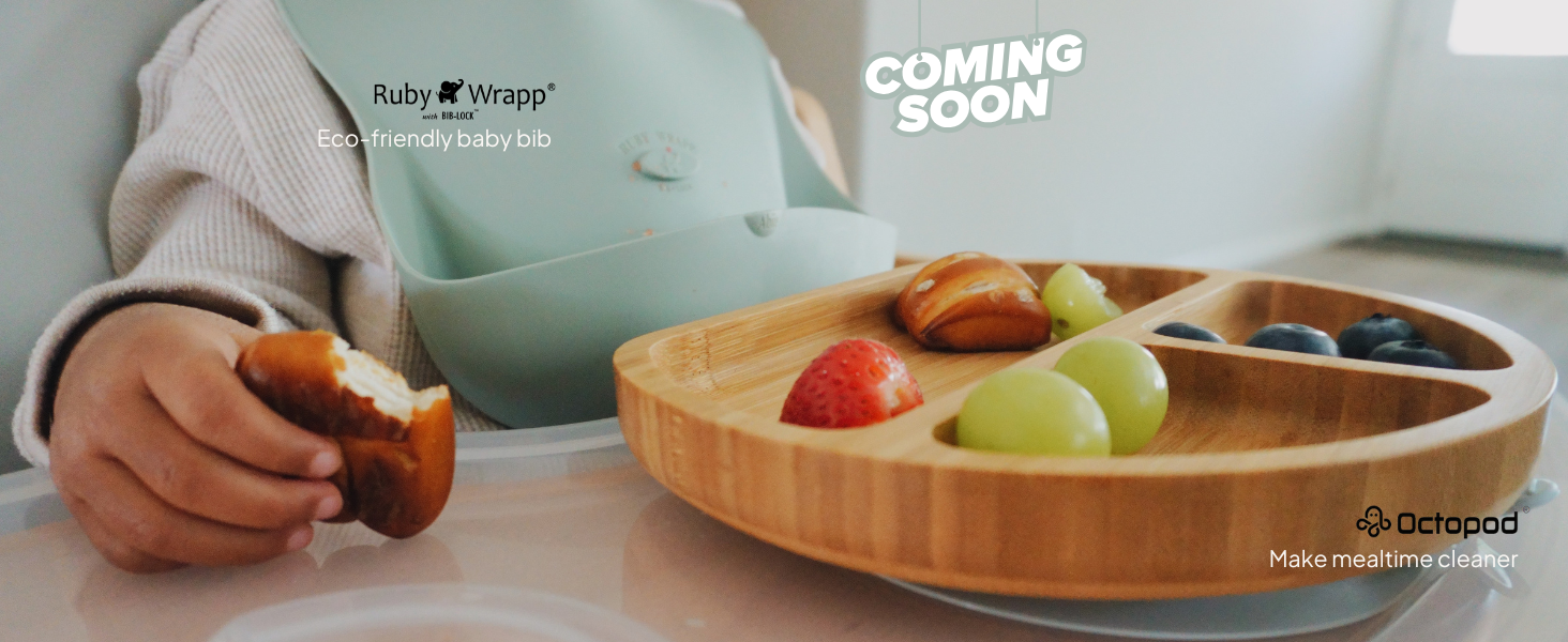 Silicone RubyWrap baby bibs in pastel colours with a deep food-catching pocket.